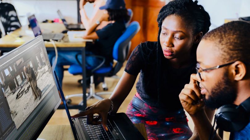 Woman teaching a man Unity