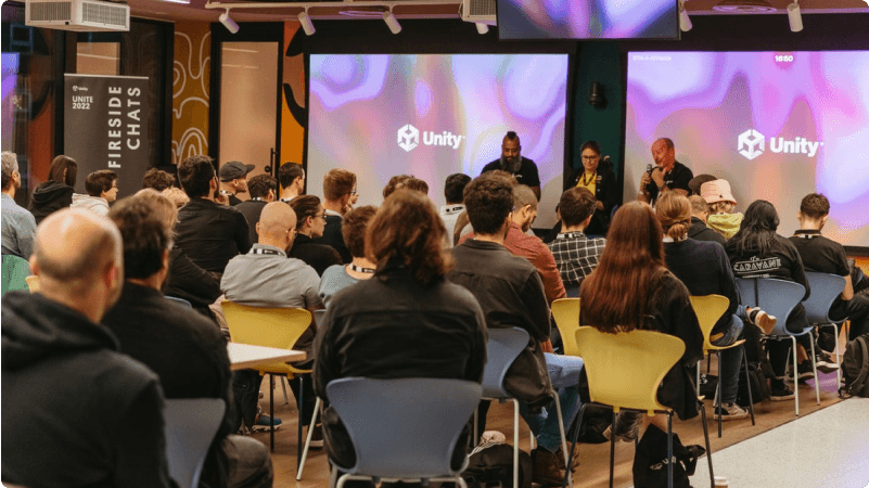 A group of people attending a Unity conference